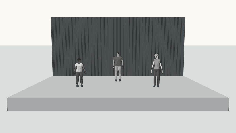 Three performers on a raised platform with a backdrop